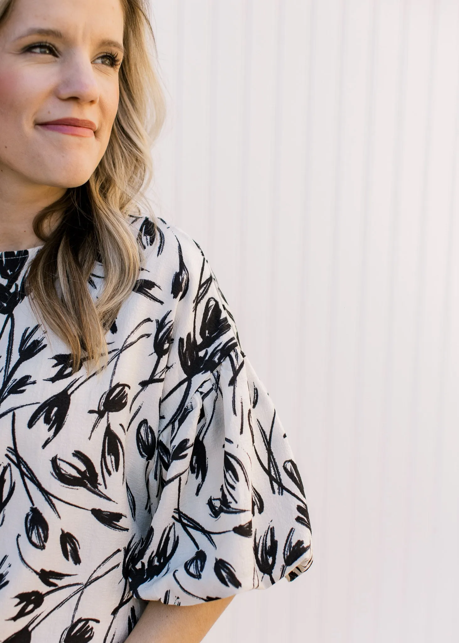 X Creamy Black Floral Top